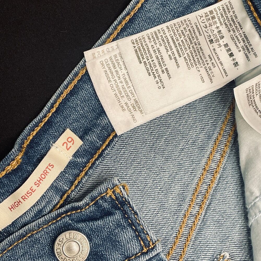~ Levi's 29 Jean Shorts Cut Off Hi-Rise Med Wash Distressed Frayed Raw Rips Blue - Picture 13 of 13